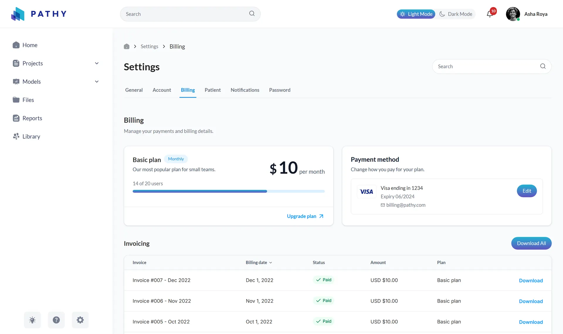 Billing settings screen with plan card, seat usage, payment method, and invoice history